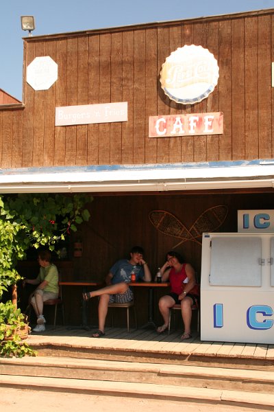 Trip (203).JPG - Kris and Sharon on the porch of "Dirty Annie's" country store in Shell, Wyoming